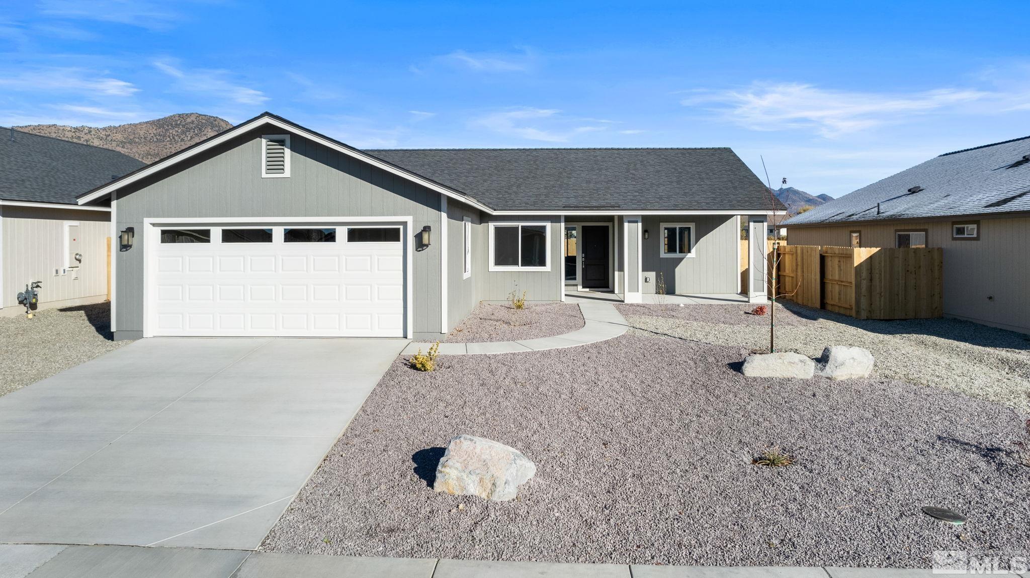 211 Green Lane Dayton, NV 89403 - Photo 28 of 28 a view of a house with a yard and garage