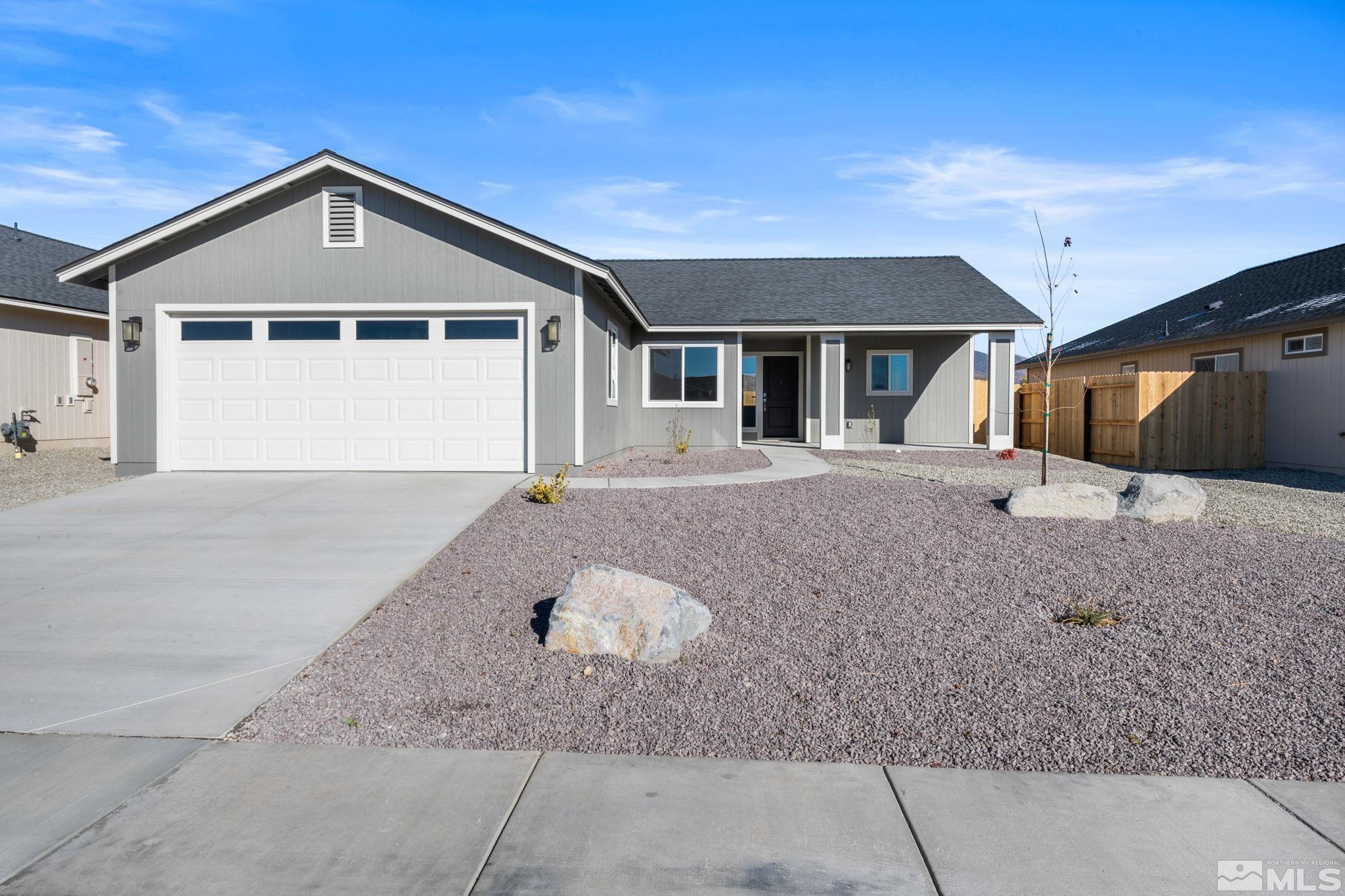 211 Green Lane Dayton, NV 89403 - Photo 3 of 28 a front view of a house with a yard