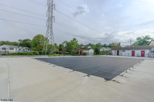 a view of a road with a building in the background