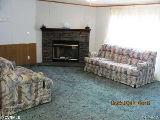 9915 Wheaton Road Petersburg, VA 23803 - Photo 5 of 12 Living Room - nice gas fireplace in spacious livin