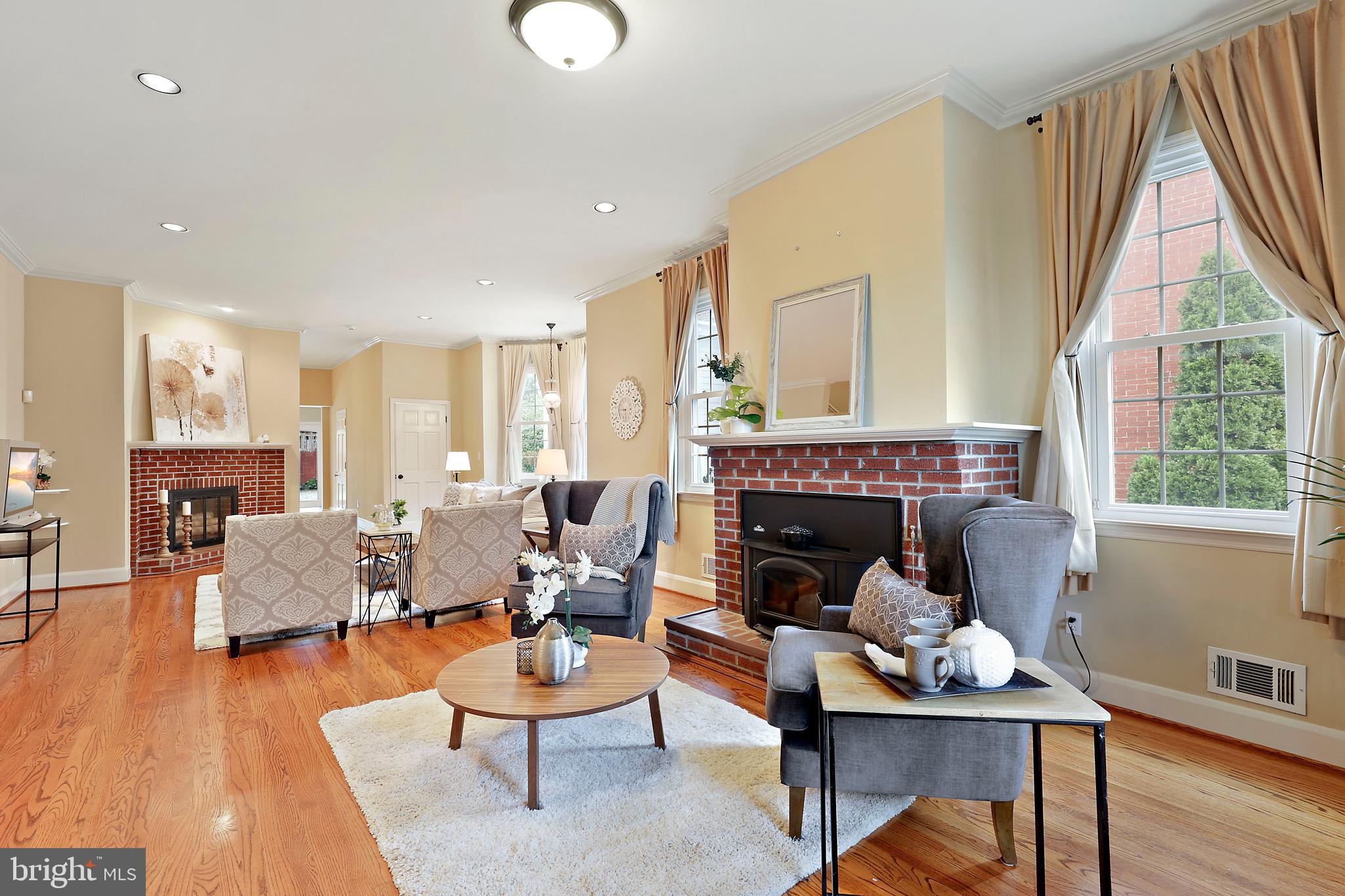 3642 Roland Avenue Baltimore, MD 21211 - Photo 11 of 61 Living Room with wood-burning stove & fireplace