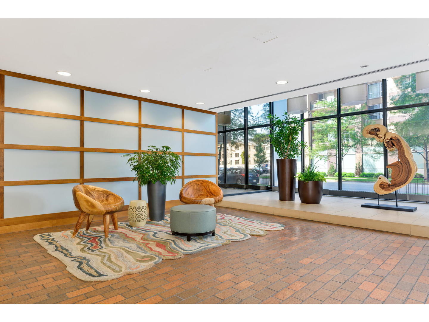 5445 North Sheridan Road, Unit 3404 Chicago, IL 60640 - Photo 2 of 24 a living room with furniture and a large window