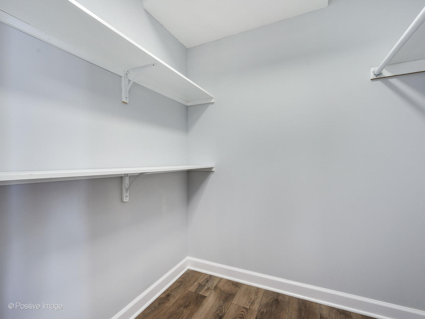 5445 North Sheridan Road, Unit 3404 Chicago, IL 60640 - Photo 21 of 24 a view of an empty walk in closet