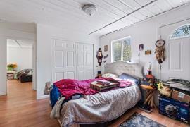 6360 Dean Road Mount Aukum, CA 95656 - Photo 14 of 19 a bedroom with a bed and a dresser