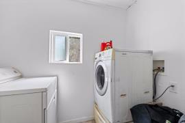 6360 Dean Road Mount Aukum, CA 95656 - Photo 10 of 19 a utility room with dryer and washer