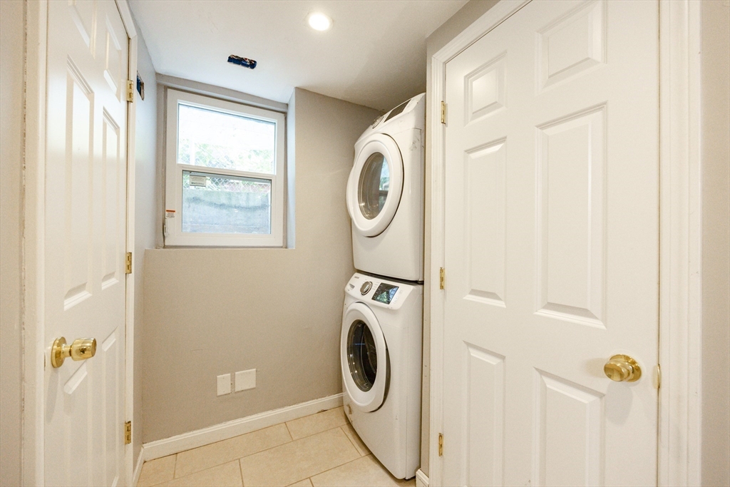210 West Sixth Street, Unit 210 Boston, MA 02127 - Photo 16 of 36 a utility room with dryer and washer