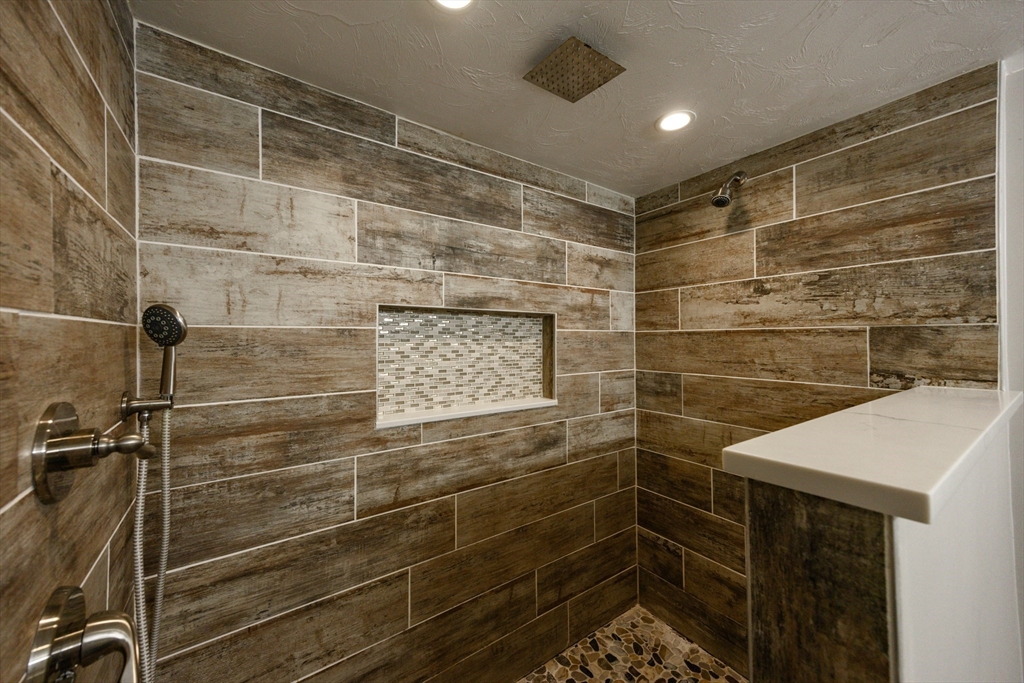 210 West Sixth Street, Unit 210 Boston, MA 02127 - Photo 19 of 36 a bathroom with a shower