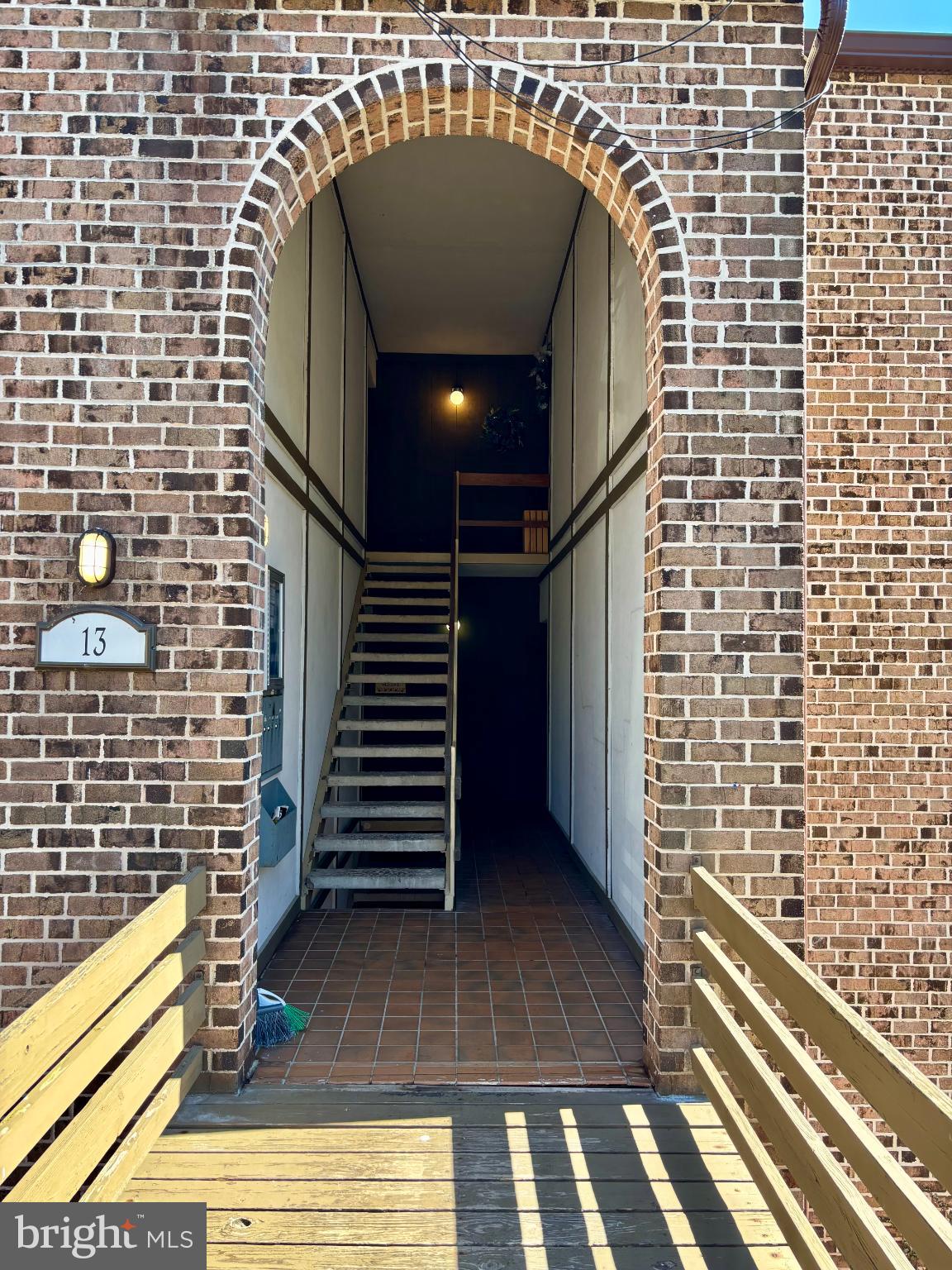a view of wooden staircase with a sink
