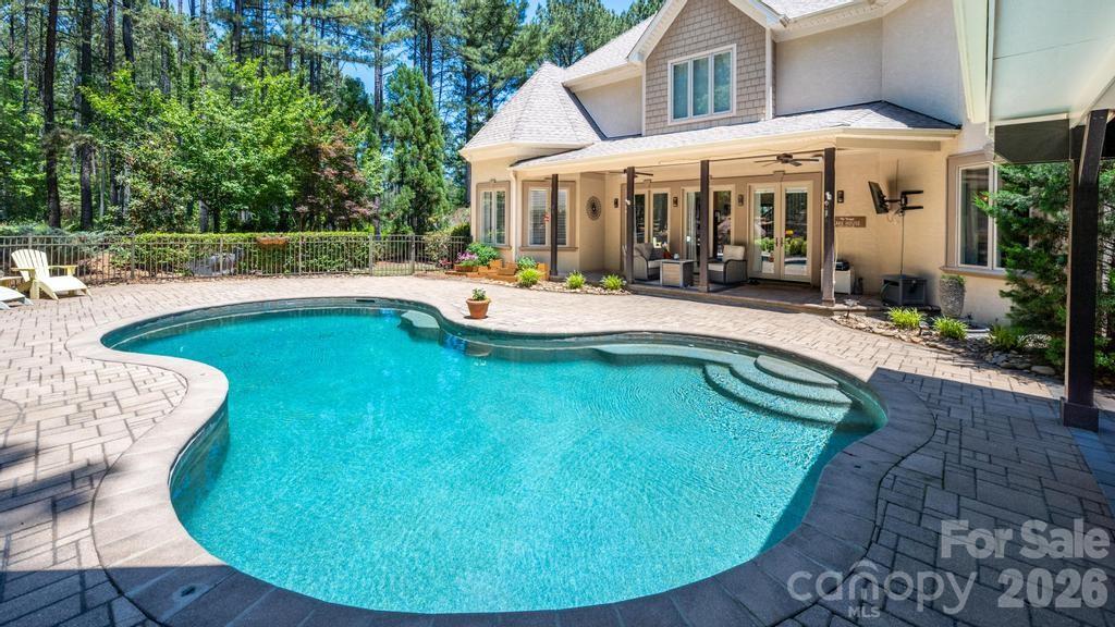7315 Bay Ridge Drive Denver, NC 28037 - Photo 6 of 39 a view of a house with swimming pool and sitting area