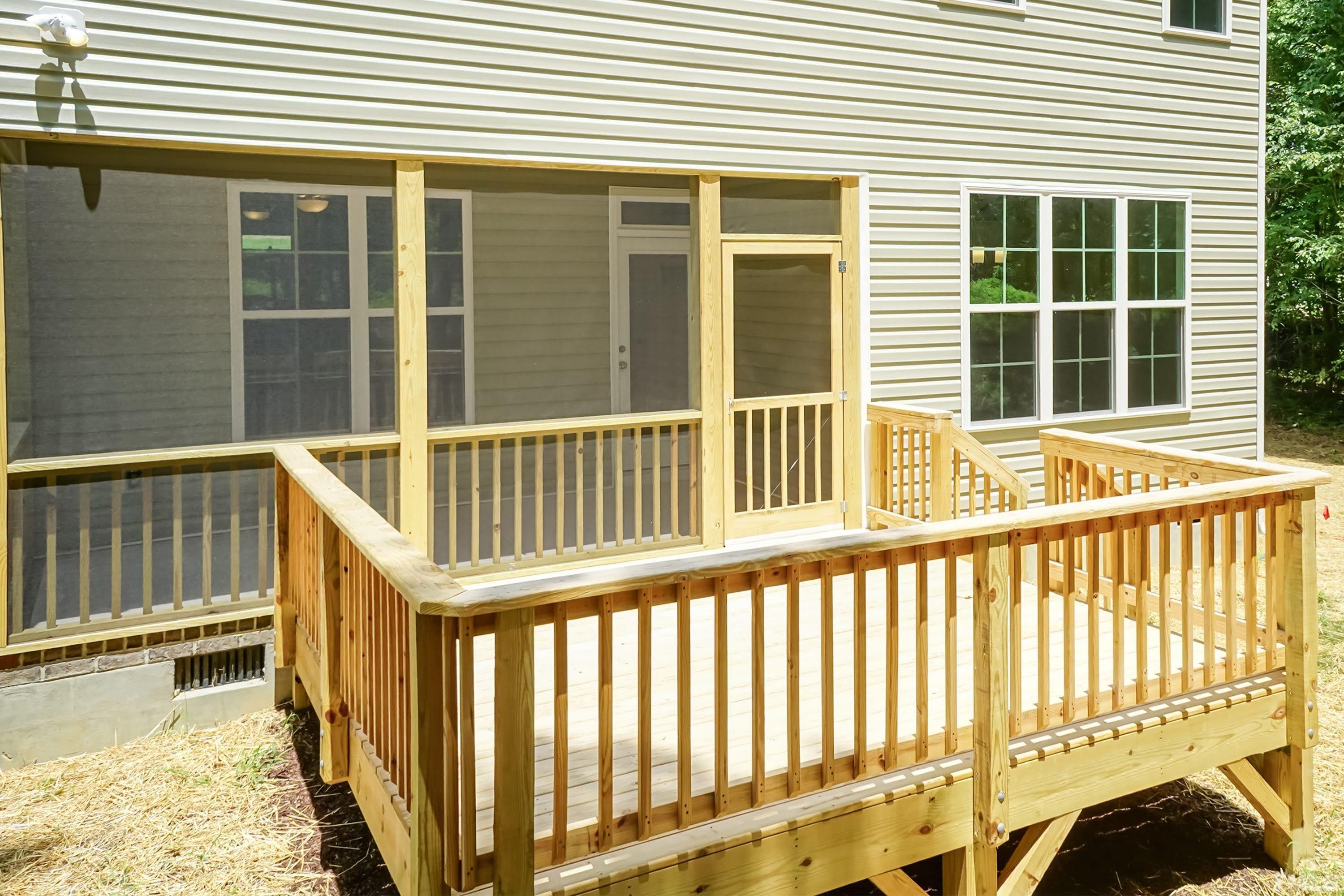 119 Carriage Loop Burlington, NC 27217 - Photo 26 of 29 a view of a balcony with a floor to ceiling window