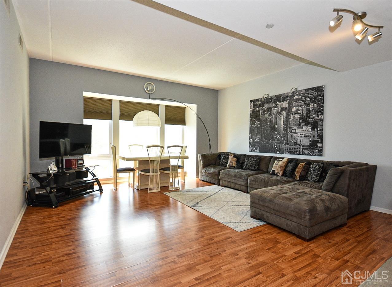 358 Rector Street, Unit 508 Perth Amboy, NJ 08861 - Photo 16 of 30 a living room with furniture and a large window