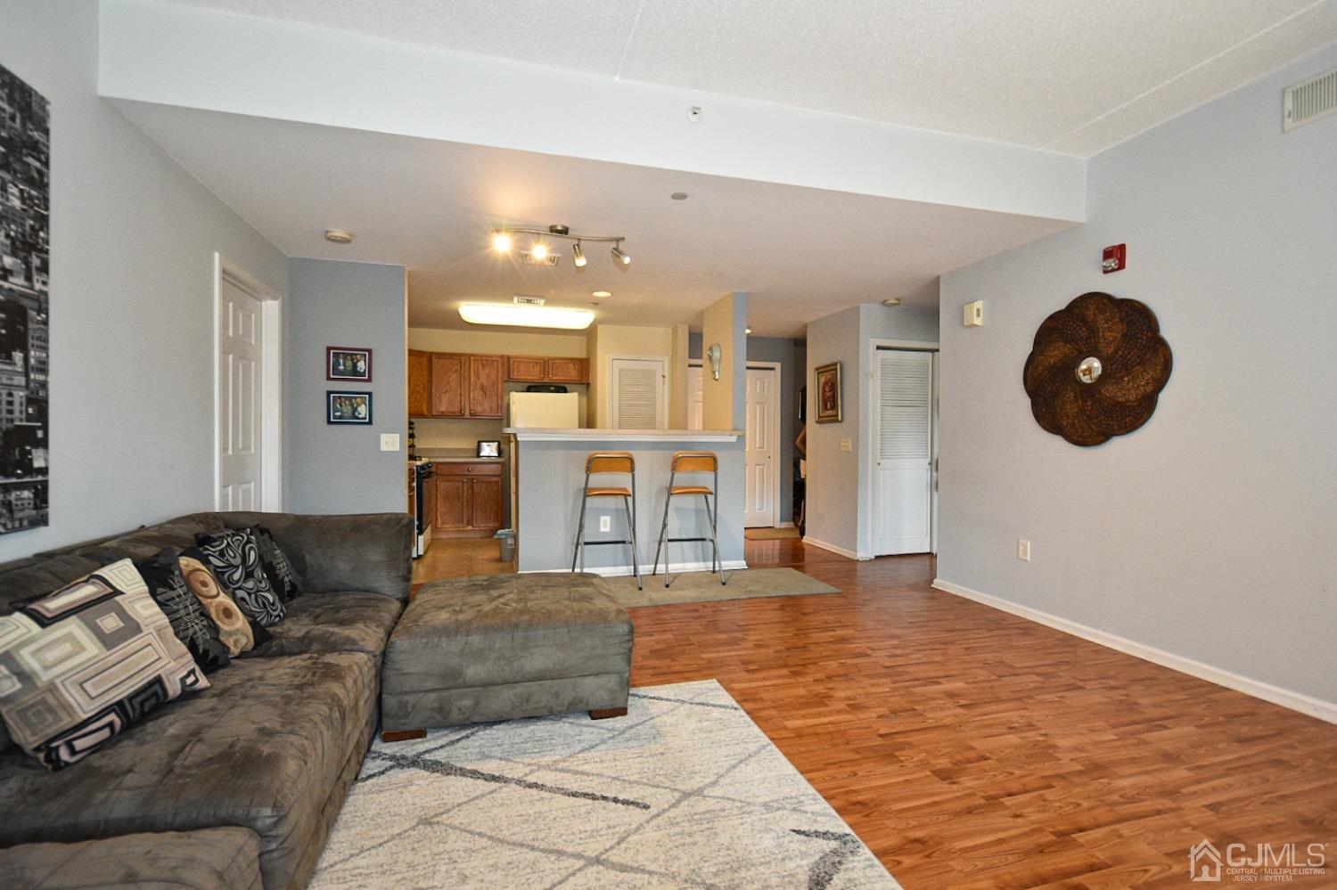 358 Rector Street, Unit 508 Perth Amboy, NJ 08861 - Photo 19 of 30 a living room with furniture and a large window