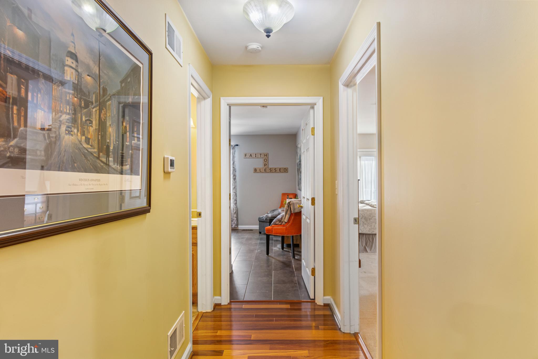 4507 Babylon Road Westminster, MD 21158 - Photo 15 of 63 a view of a hallway with wooden floor and dining room