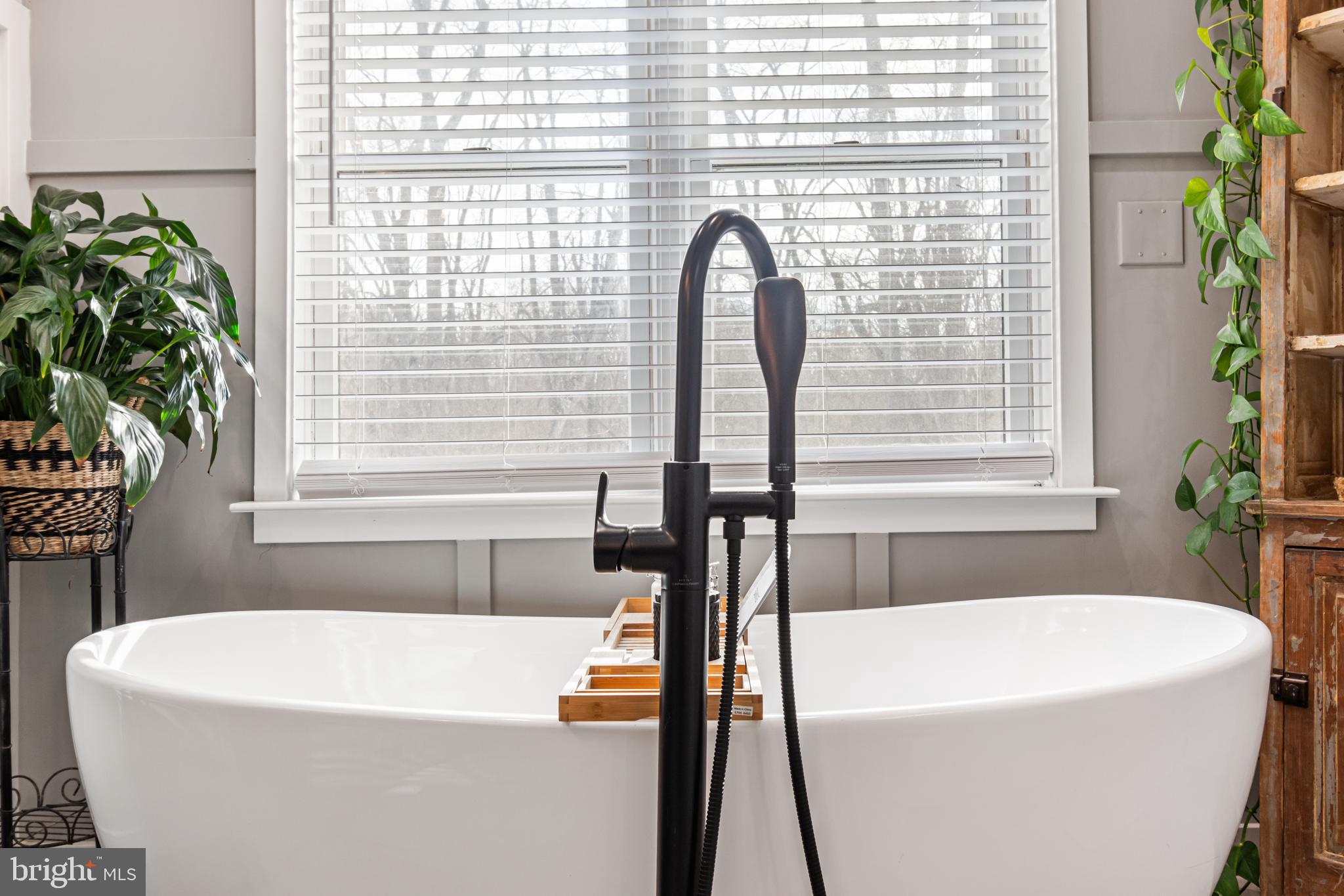 4507 Babylon Road Westminster, MD 21158 - Photo 29 of 63 a white bath tub sitting in a bathroom next to a window