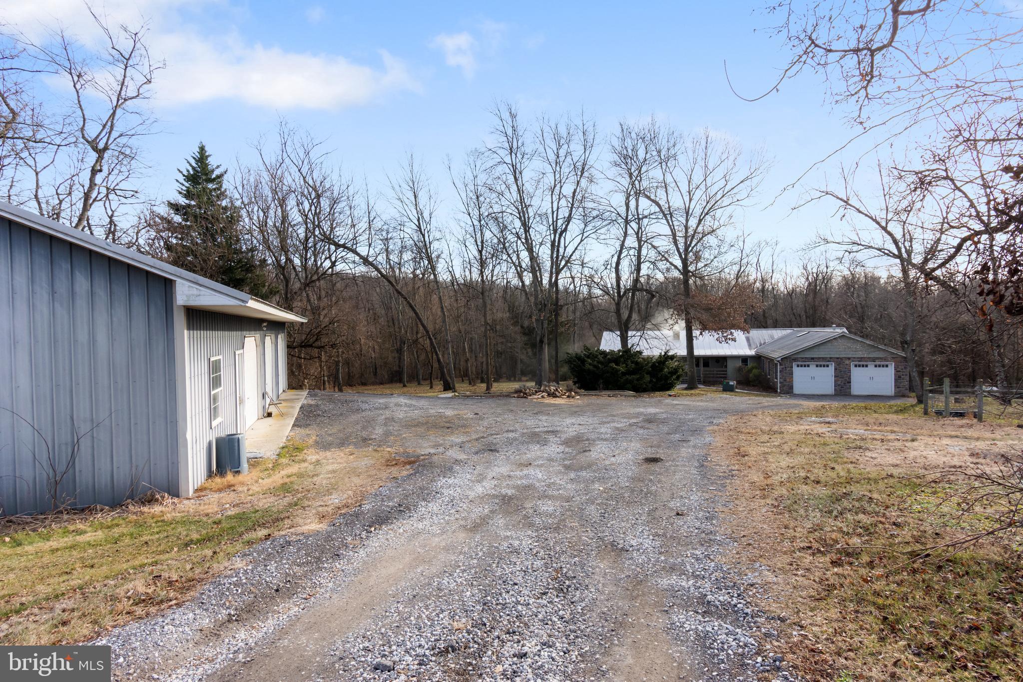 4507 Babylon Road Westminster, MD 21158 - Photo 45 of 63 a view of a house with a yard covered in snow