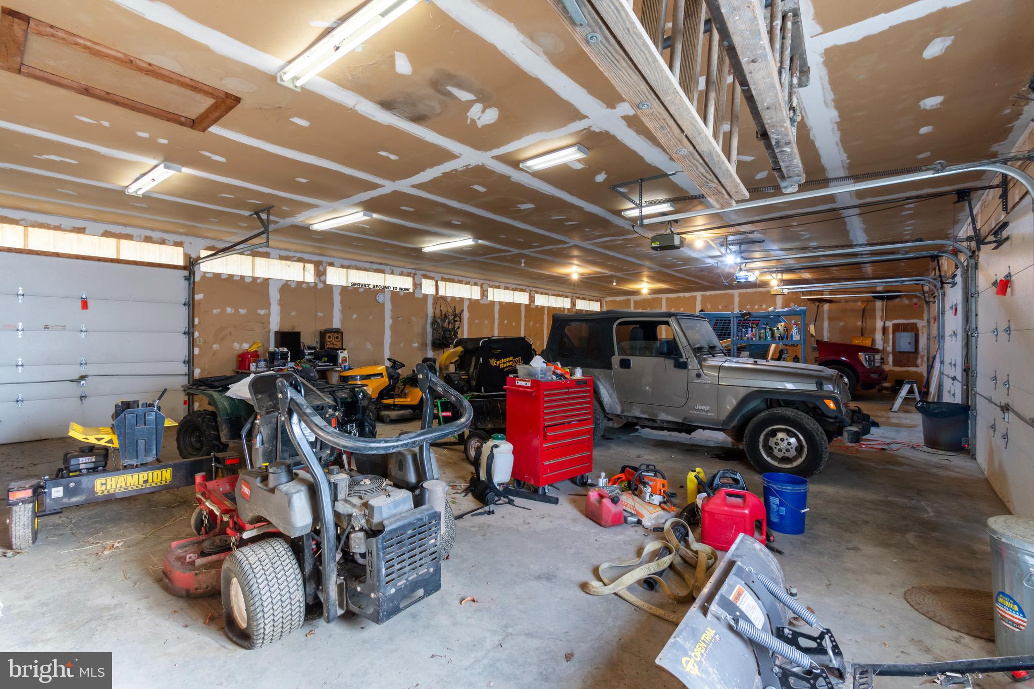 4507 Babylon Road Westminster, MD 21158 - Photo 47 of 63 a view of a garage with a bike and car