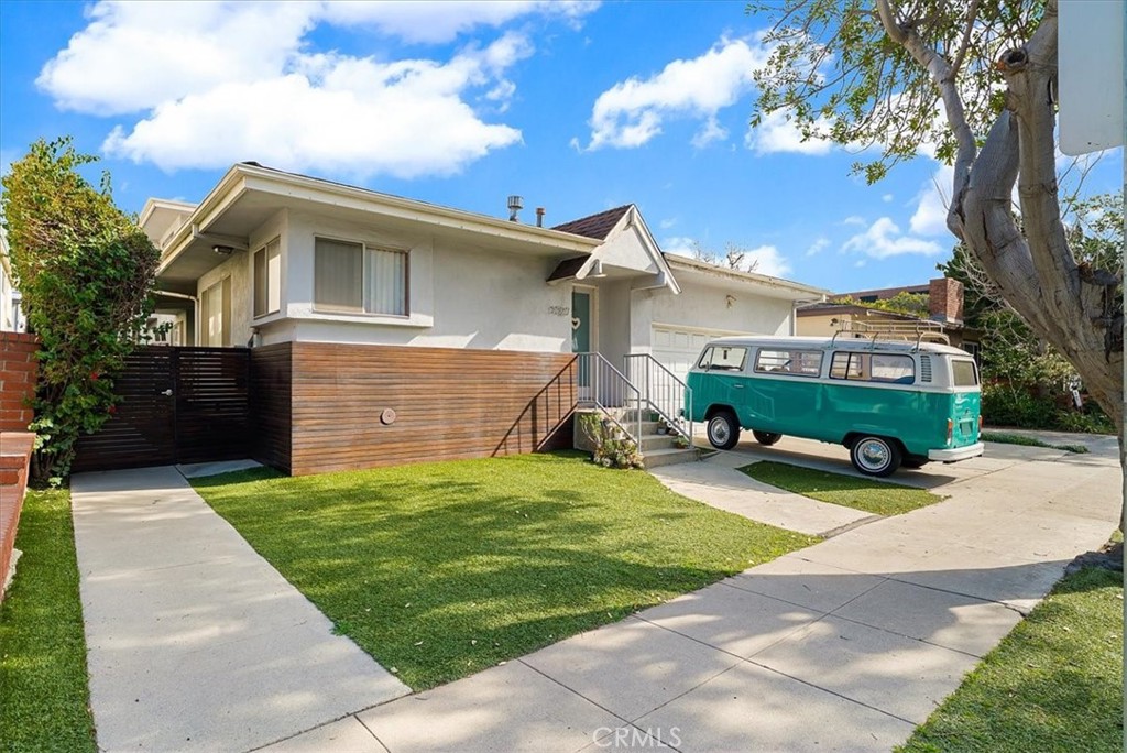 1527 Princeton Street, Unit 2 Santa Monica, CA 90404 - Photo 11 of 11 a view of a house with backyard and a tree
