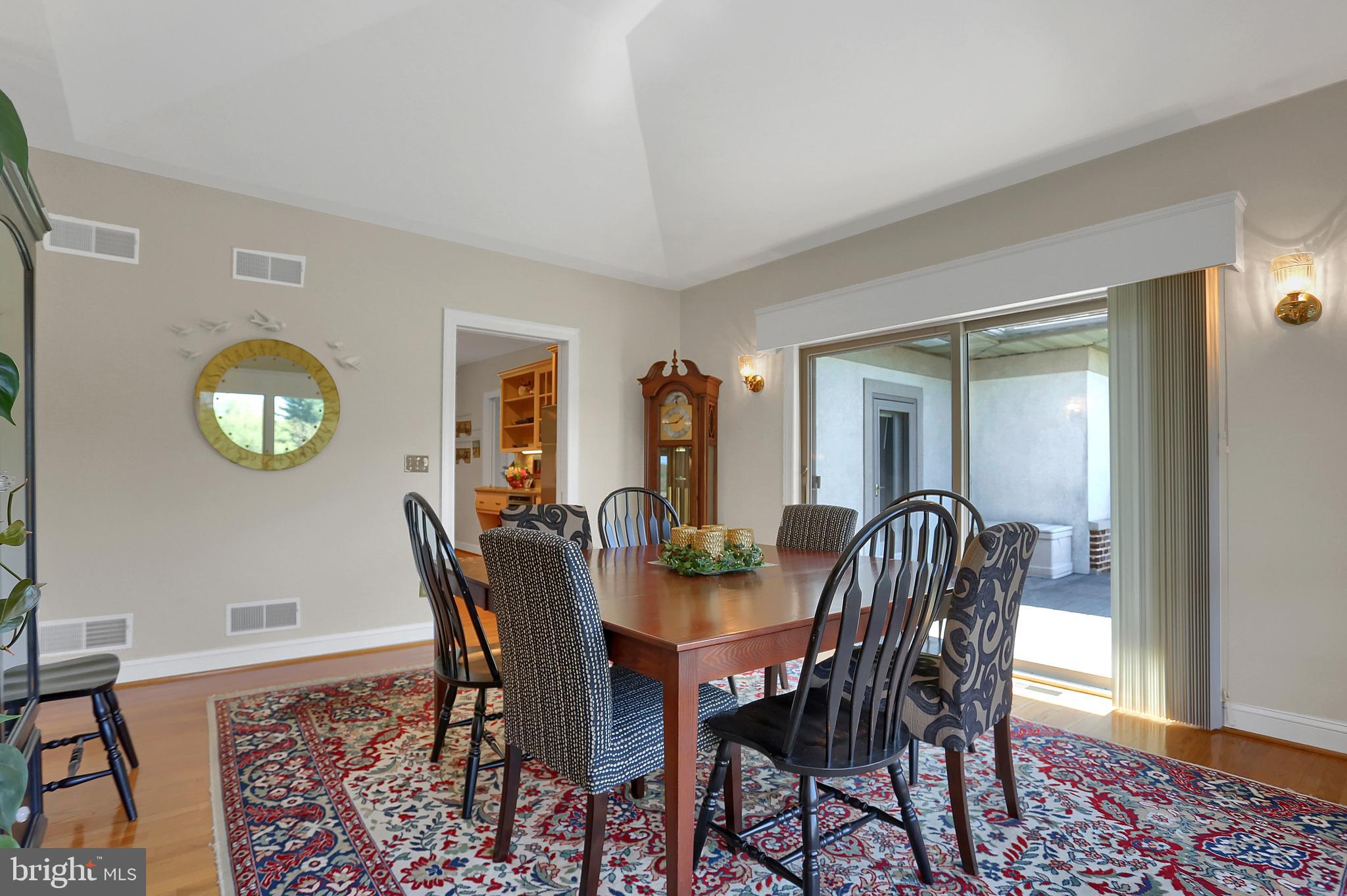306 Deer Trail Drive Spring Grove, PA 17362 - Photo 14 of 44 Glass doors lead from dining room to a large deck
