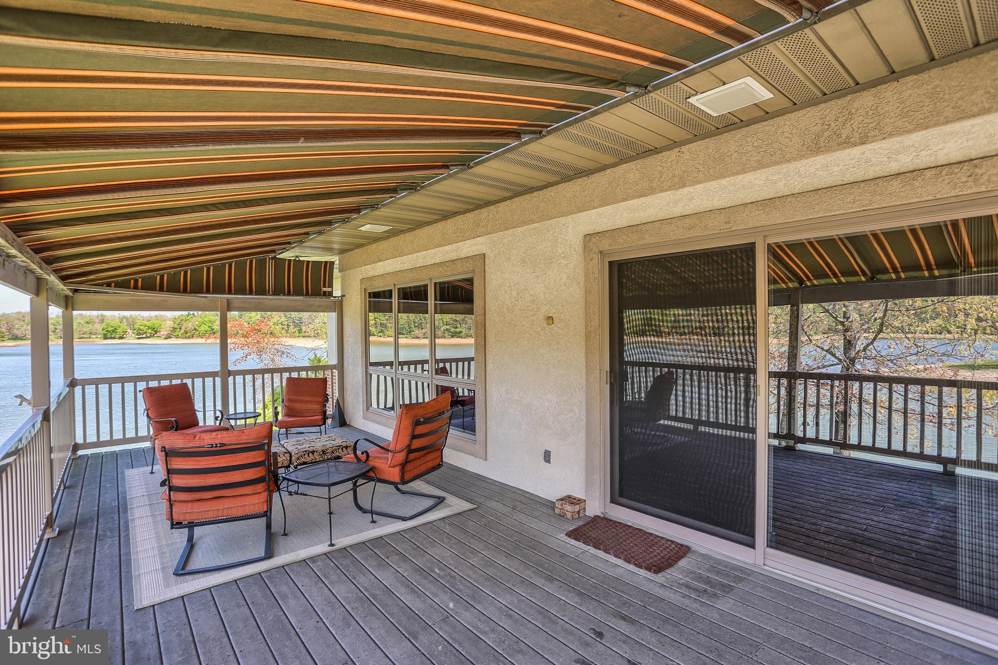 306 Deer Trail Drive Spring Grove, PA 17362 - Photo 28 of 44 Large deck with awning off great room