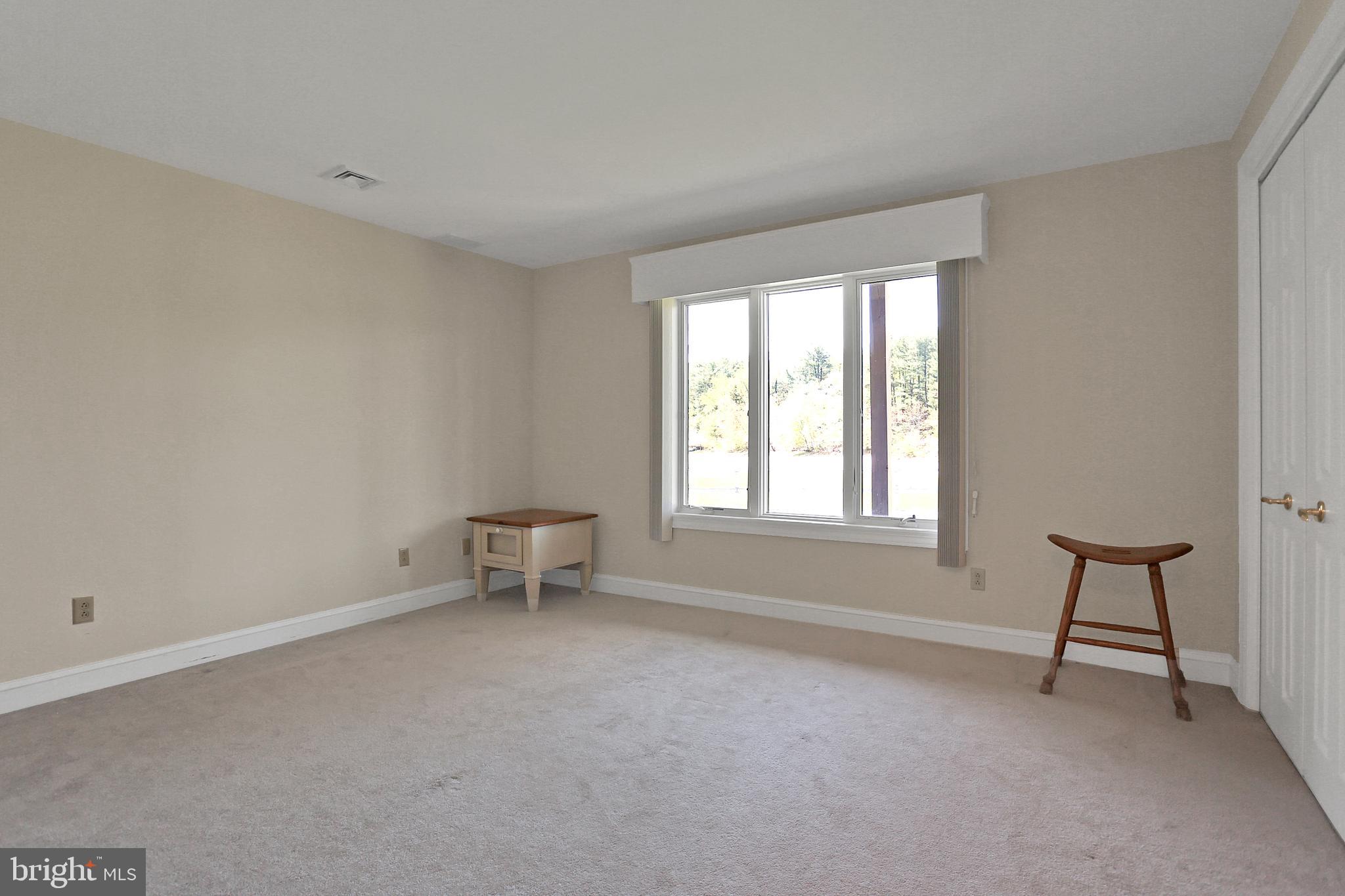 306 Deer Trail Drive Spring Grove, PA 17362 - Photo 34 of 44 2nd bedroom w/neutral carpet, closet & view