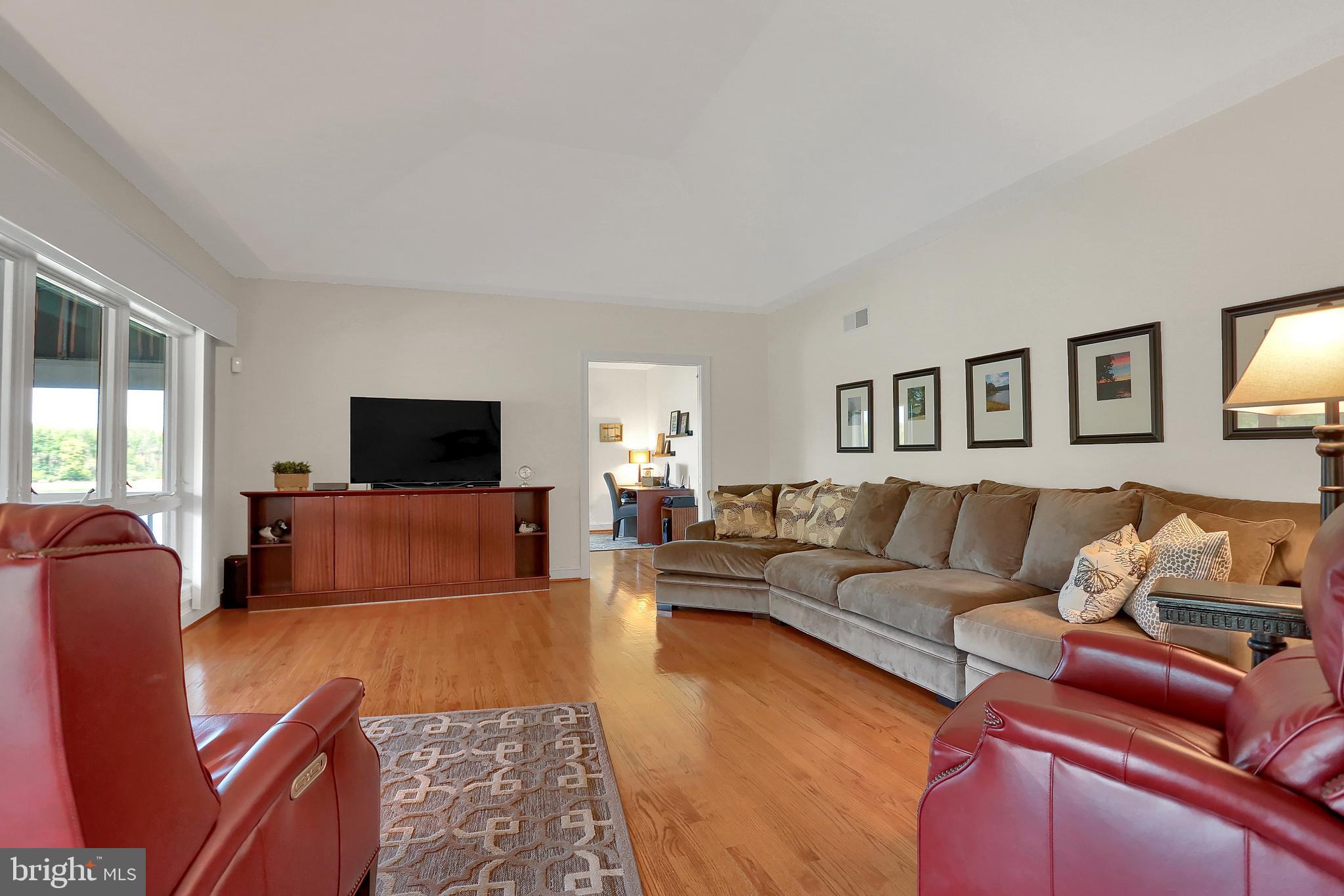 306 Deer Trail Drive Spring Grove, PA 17362 - Photo 9 of 44 Huge great room w/ hardwood floors & tray ceiling