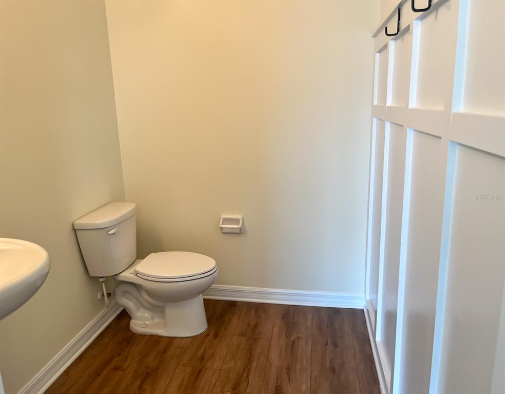 7690 Tuscan Bay Circle Wesley Chapel, FL 33545 - Photo 13 of 14 a bathroom with a toilet and a sink