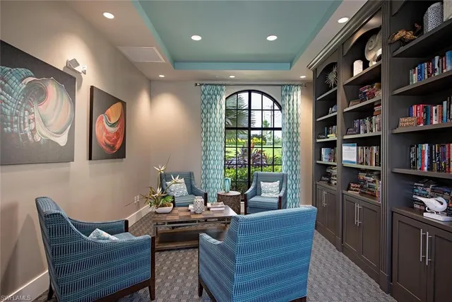 a workspace with furniture and window