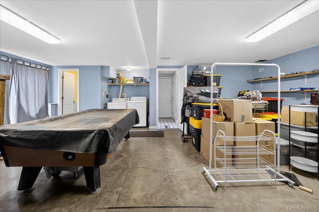 74 Pocatello Road Middletown, NY 10940 - Photo 17 of 21 Rec room with billiards, washing machine and clothes dryer, and concrete floors