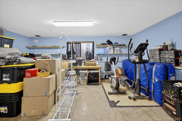 a view of a workspace with furniture