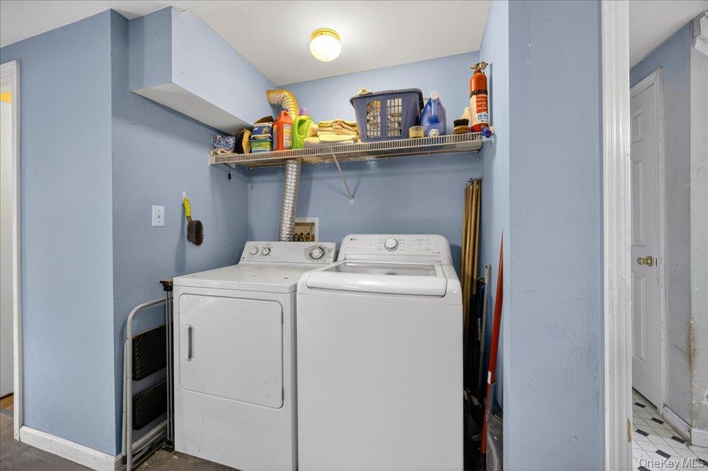 74 Pocatello Road Middletown, NY 10940 - Photo 19 of 21 Laundry room featuring baseboards and washer and dryer
