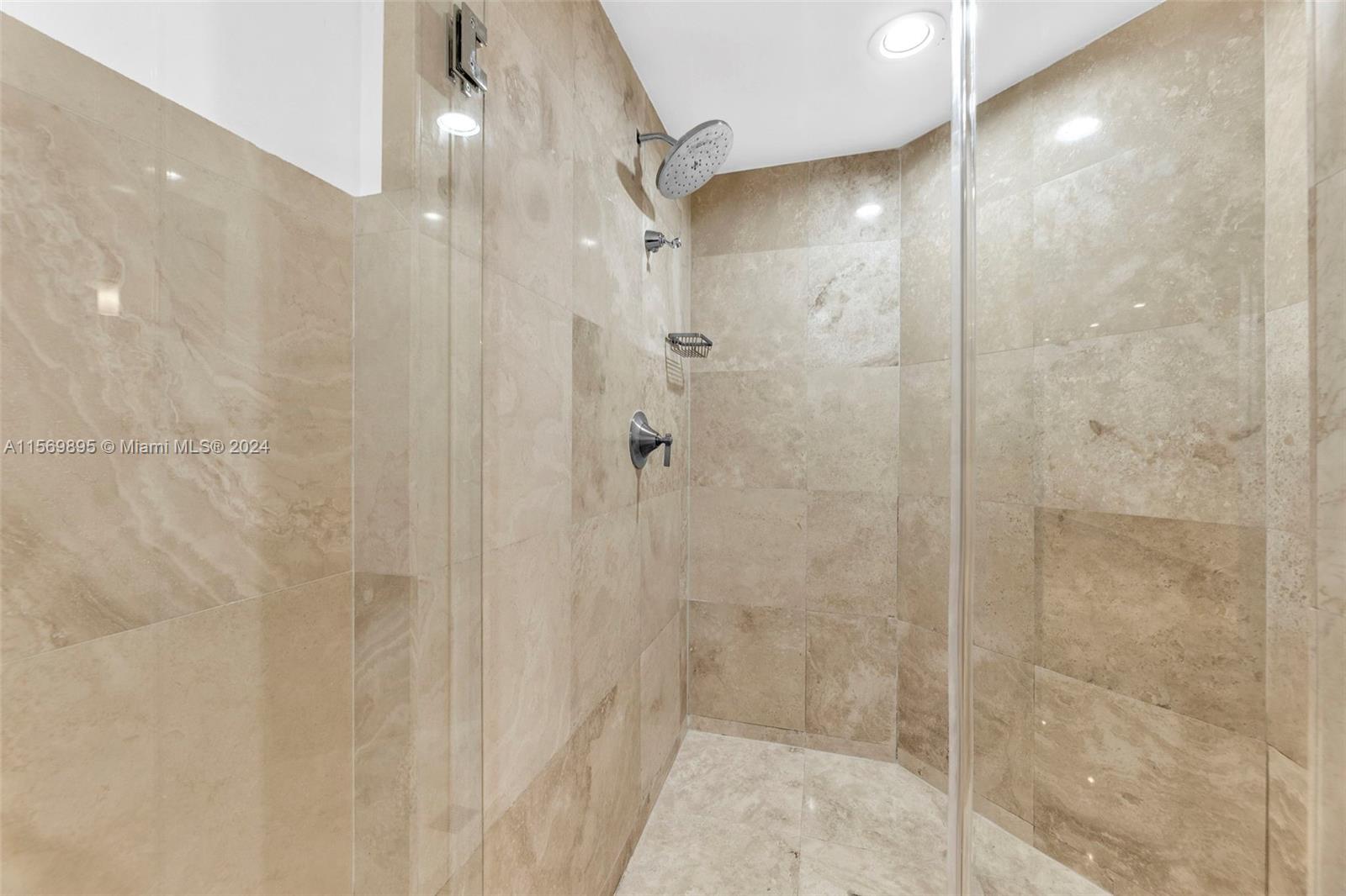 3540 Main Highway, Unit 310 Miami, FL 33133 - Photo 19 of 47 a bathroom with a shower