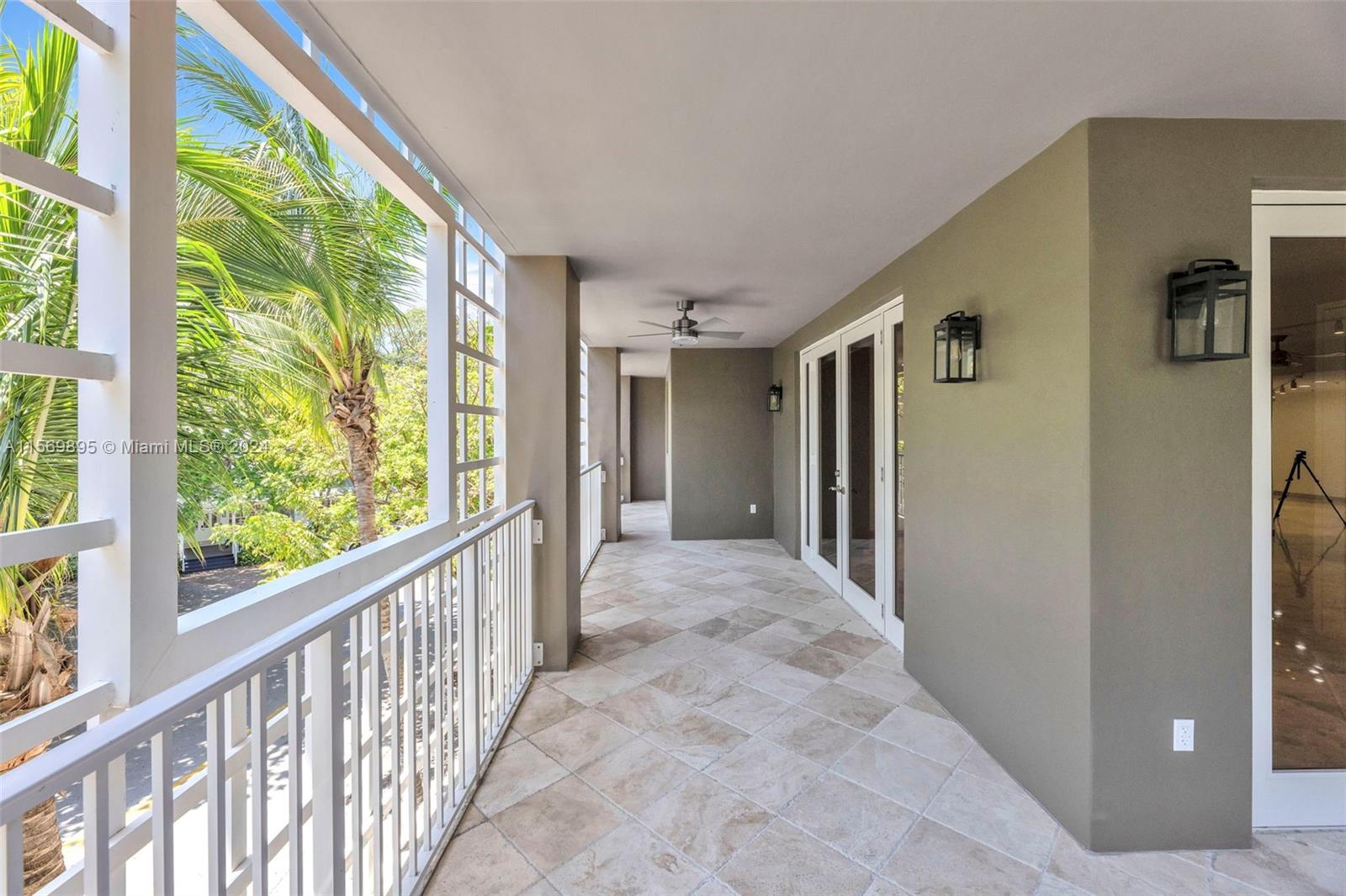 3540 Main Highway, Unit 310 Miami, FL 33133 - Photo 23 of 47 a view of hallway with windows