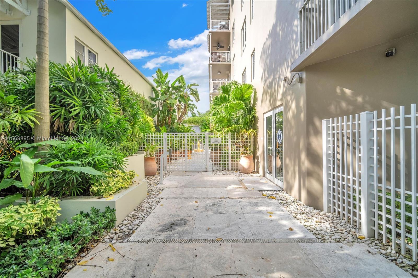 3540 Main Highway, Unit 310 Miami, FL 33133 - Photo 35 of 47 a view of a entrance with a house