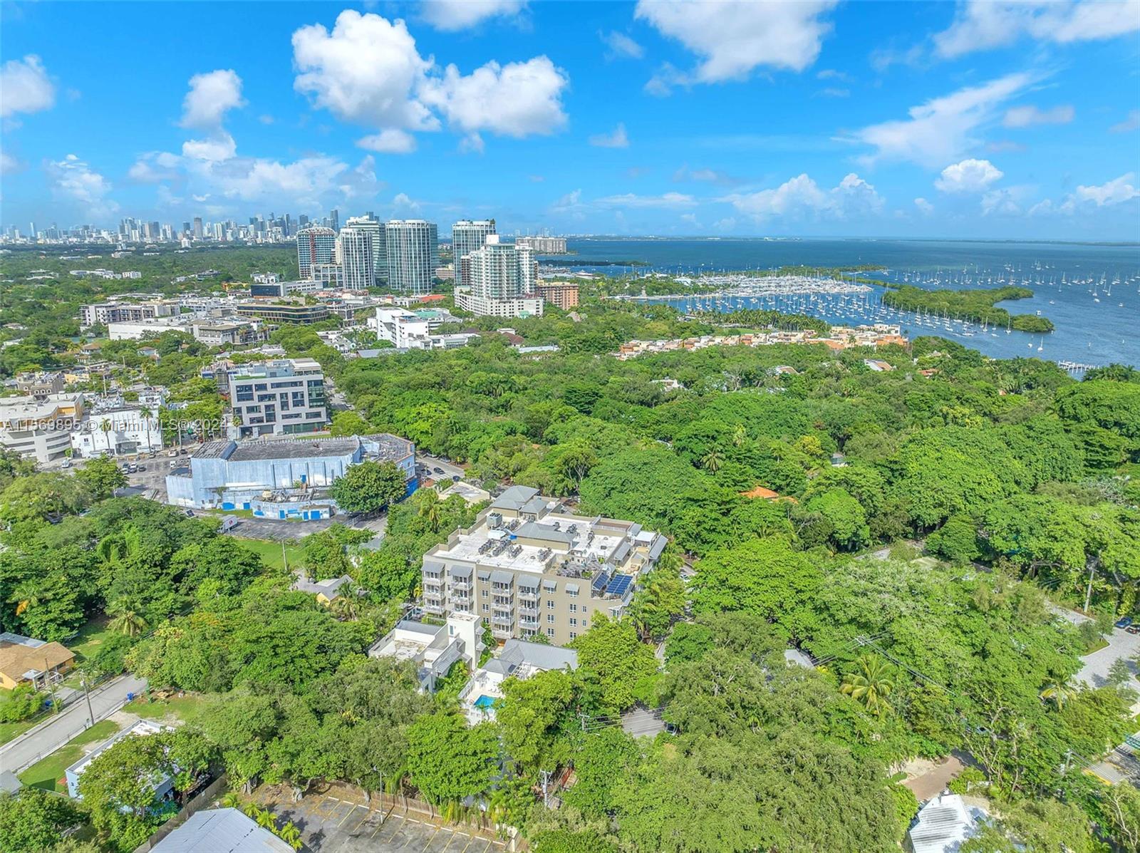 3540 Main Highway, Unit 310 Miami, FL 33133 - Photo 44 of 47 a view of a city with a lake view