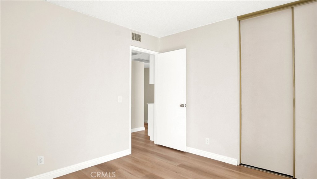 47 Town And Country Road Pomona, CA 91766 - Photo 22 of 32 a view of a room with wooden floor
