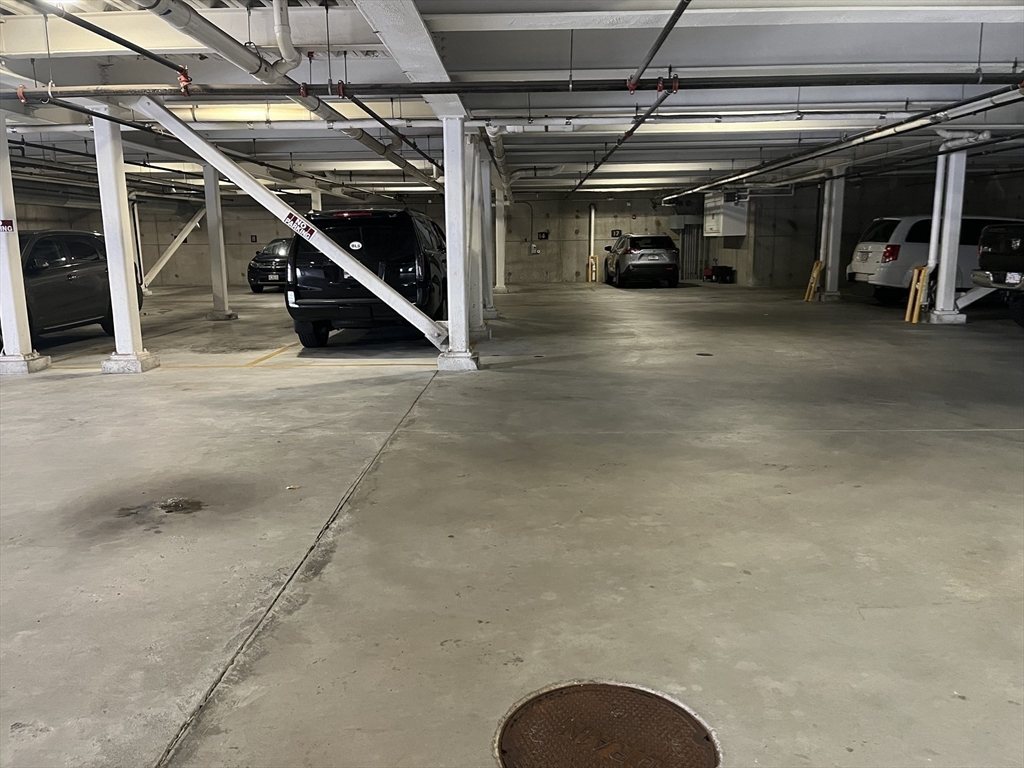 45 Spring Street, Unit 18 Boston, MA 02132 - Photo 24 of 29 a view of car garage