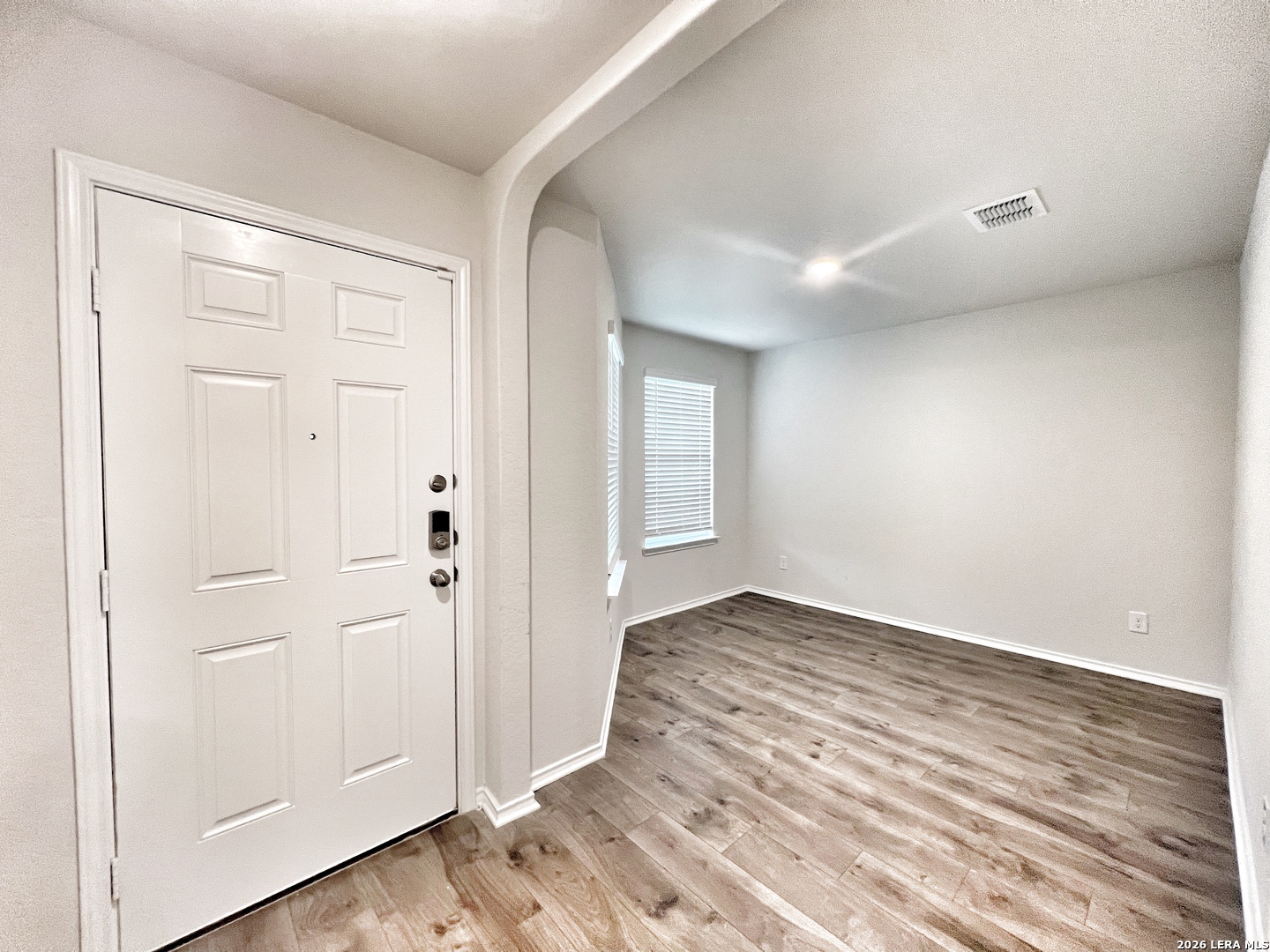 29529 Spring Copper Bulverde, TX 78163 - Photo 3 of 41 a view of an empty room and wooden floor