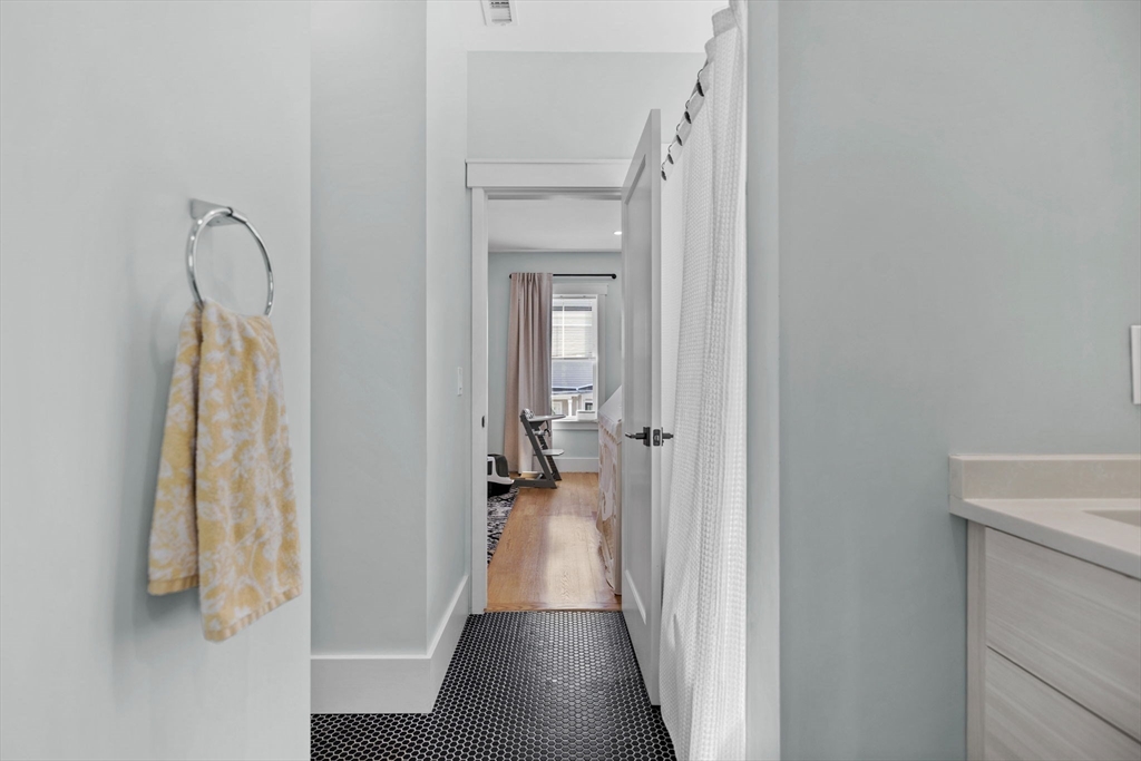 11 Ashland Street, Unit 2 Boston, MA 02122 - Photo 21 of 34 a view of a bathroom from the hallway