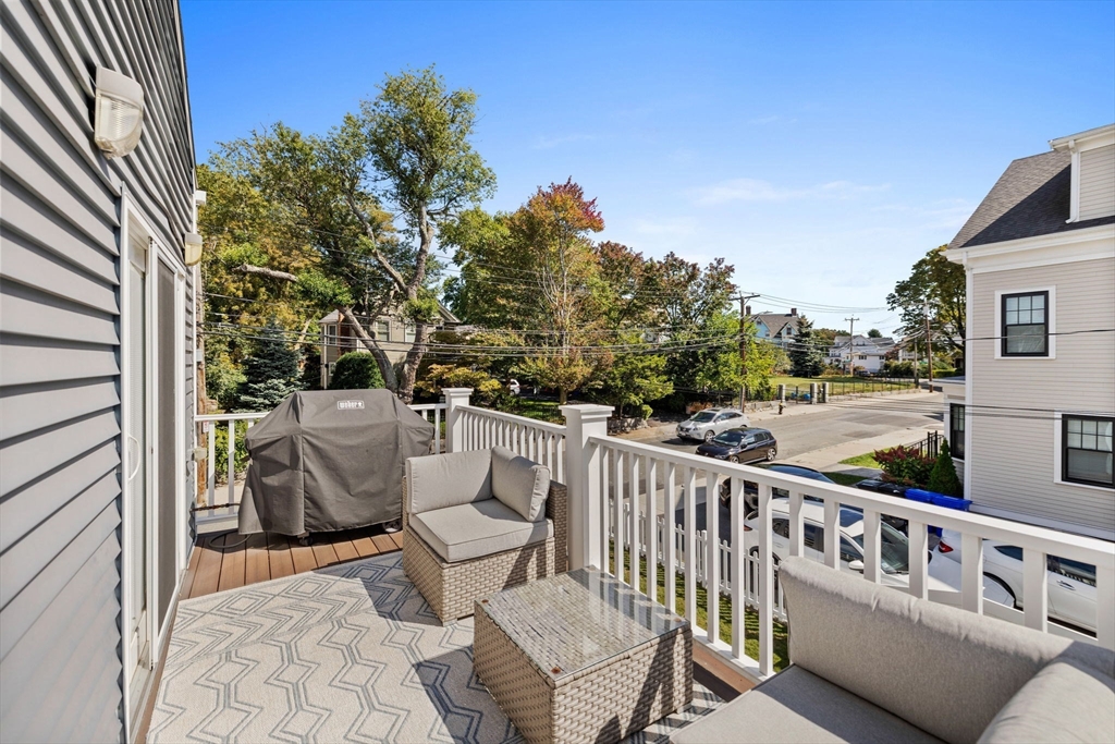 11 Ashland Street, Unit 2 Boston, MA 02122 - Photo 25 of 34 a view of a patio on the deck