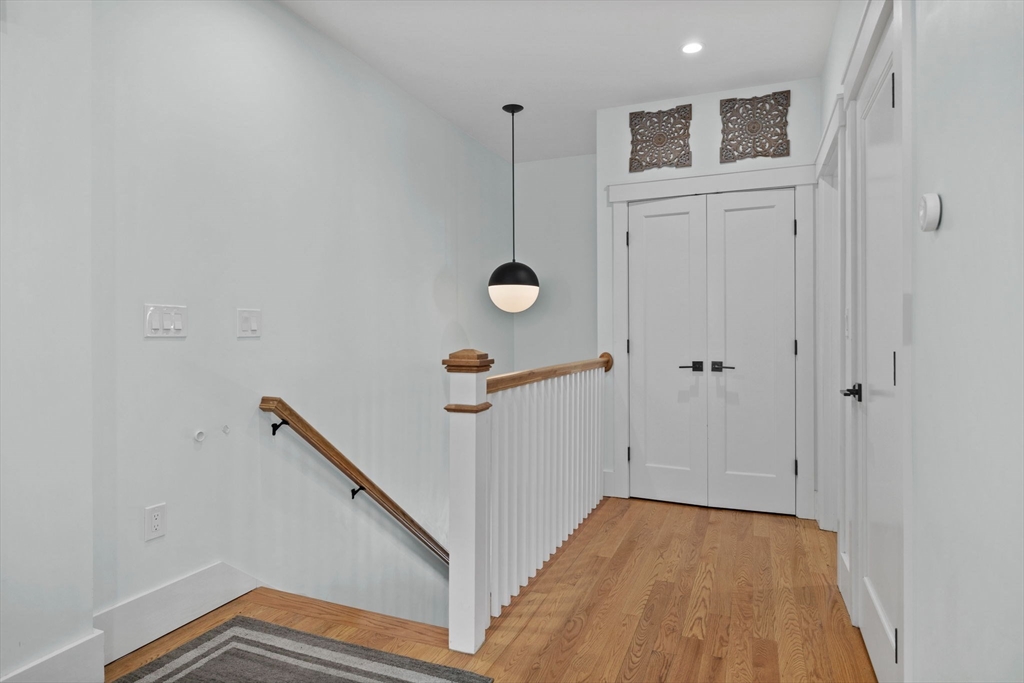 11 Ashland Street, Unit 2 Boston, MA 02122 - Photo 28 of 34 a view of a hallway with staircase