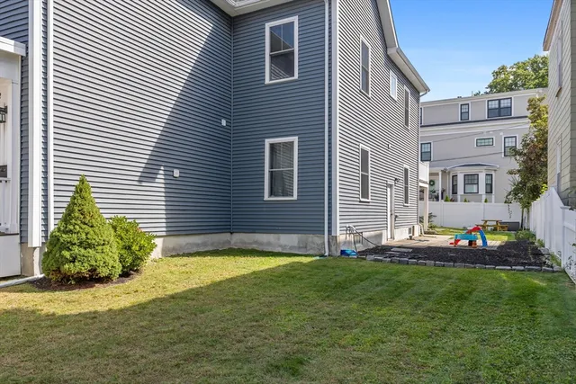 a house with garden in front of it