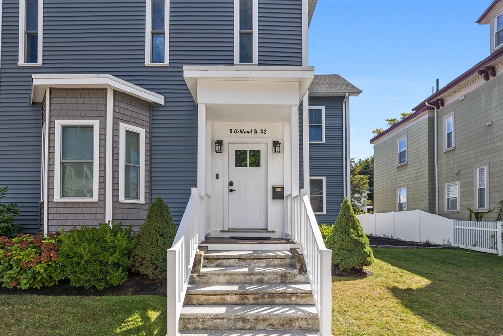 11 Ashland Street, Unit 2 Boston, MA 02122 - Photo 33 of 34 a front view of a house with garden