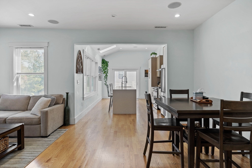 11 Ashland Street, Unit 2 Boston, MA 02122 - Photo 10 of 34 a living room with furniture and wooden floor