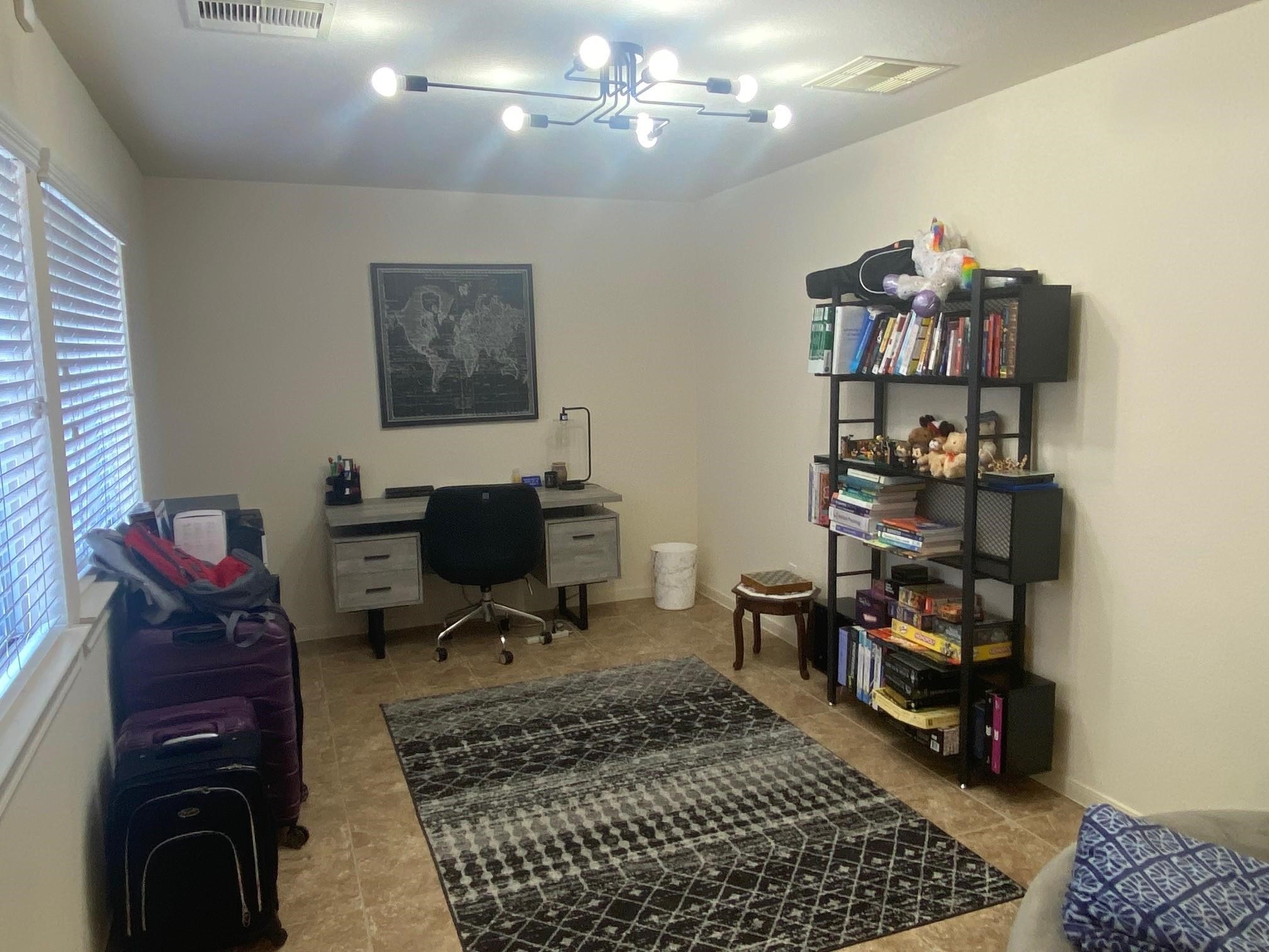 3209 Clearview Circle Houston, TX 77025 - Photo 11 of 13 a view of a workspace with furniture