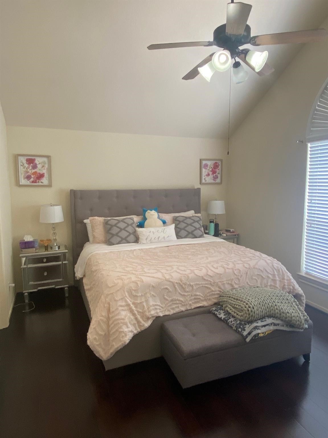 3209 Clearview Circle Houston, TX 77025 - Photo 7 of 13 a bedroom with a bed and a chandelier