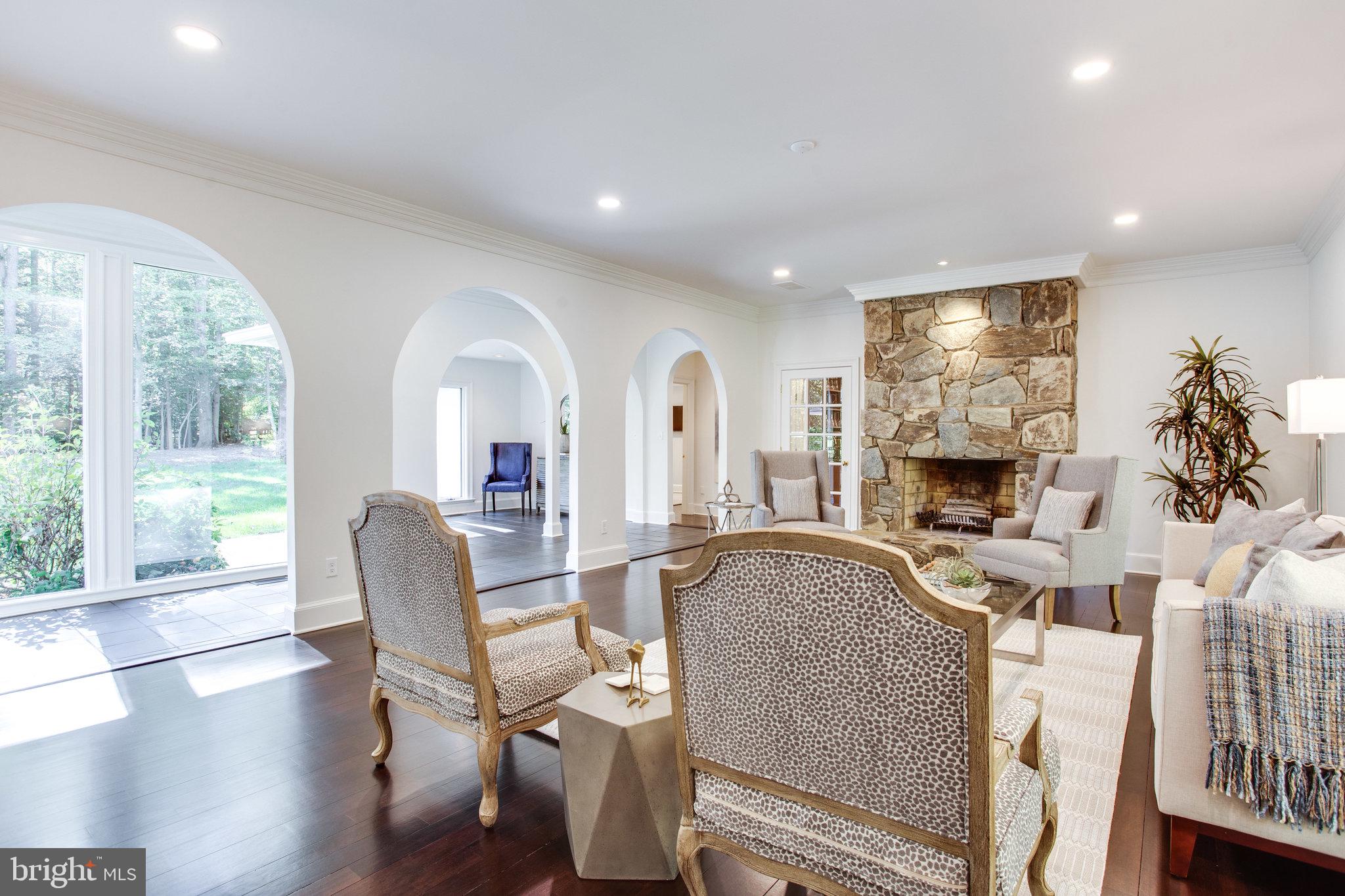 137 Yarnick Road Great Falls, VA 22066 - Photo 14 of 61 Stone woodburning fireplace