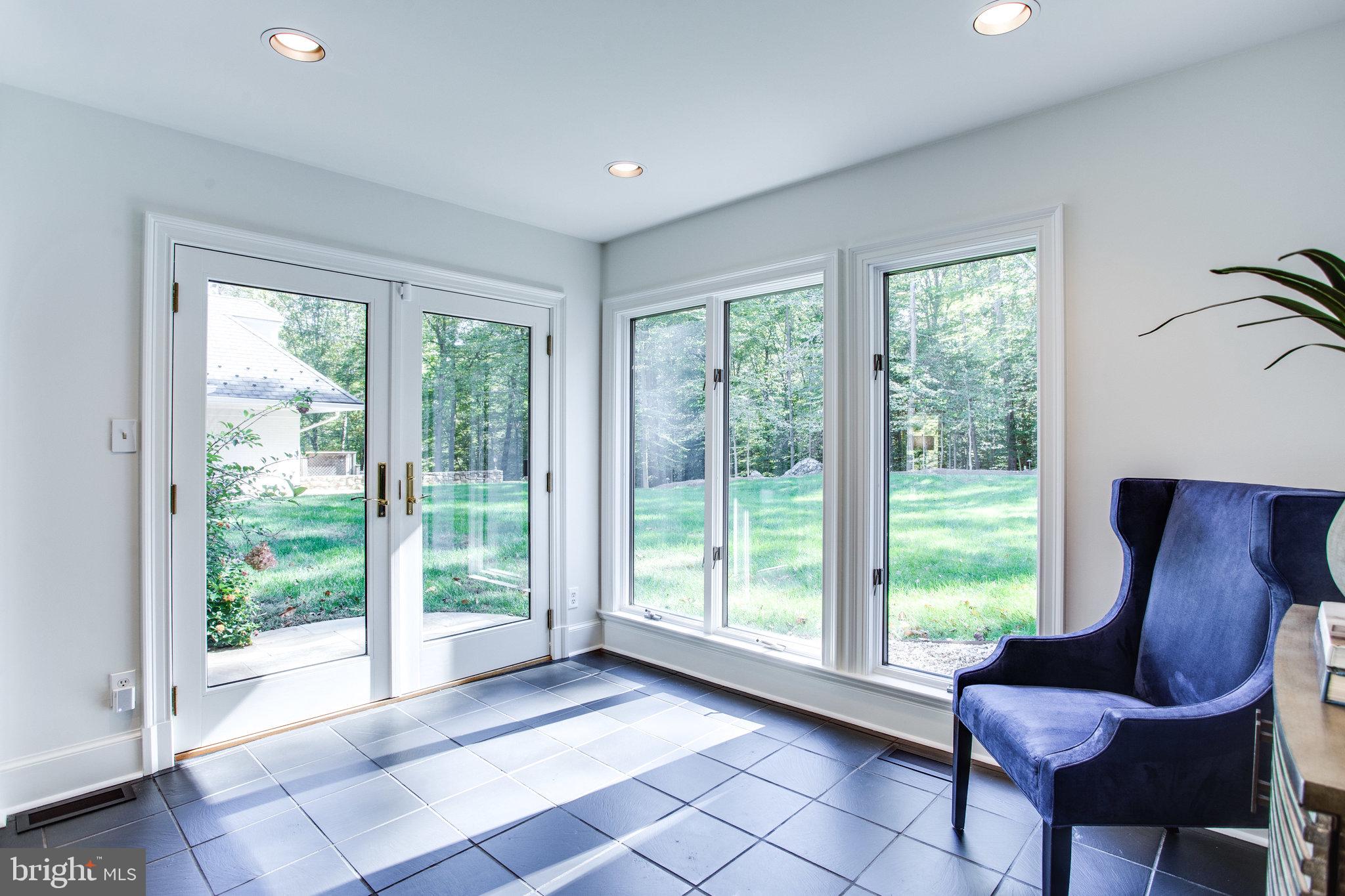 137 Yarnick Road Great Falls, VA 22066 - Photo 15 of 61 Sunroom with french doors to yard