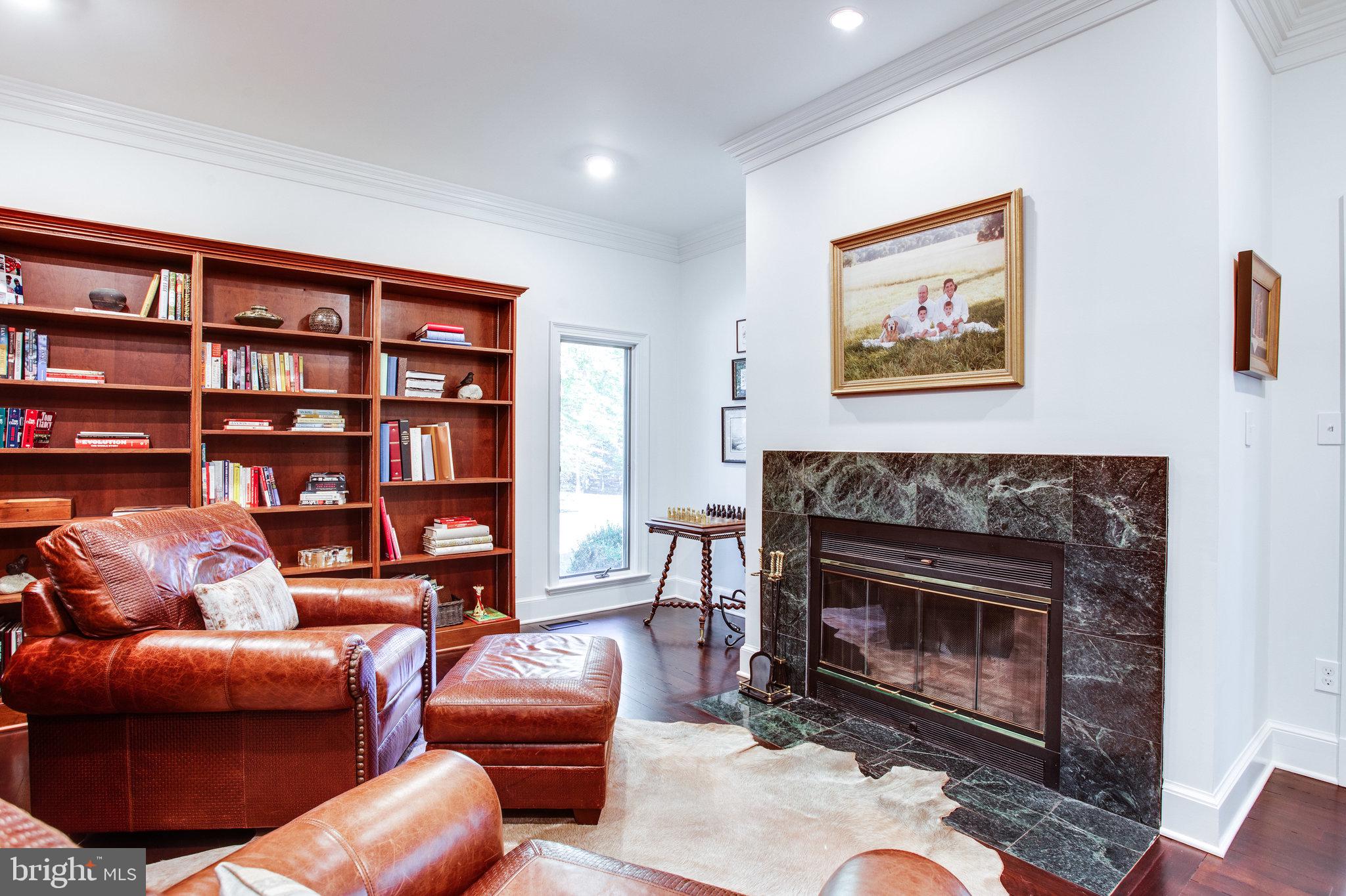 137 Yarnick Road Great Falls, VA 22066 - Photo 23 of 61 Cozy up with a good book by the fireplace