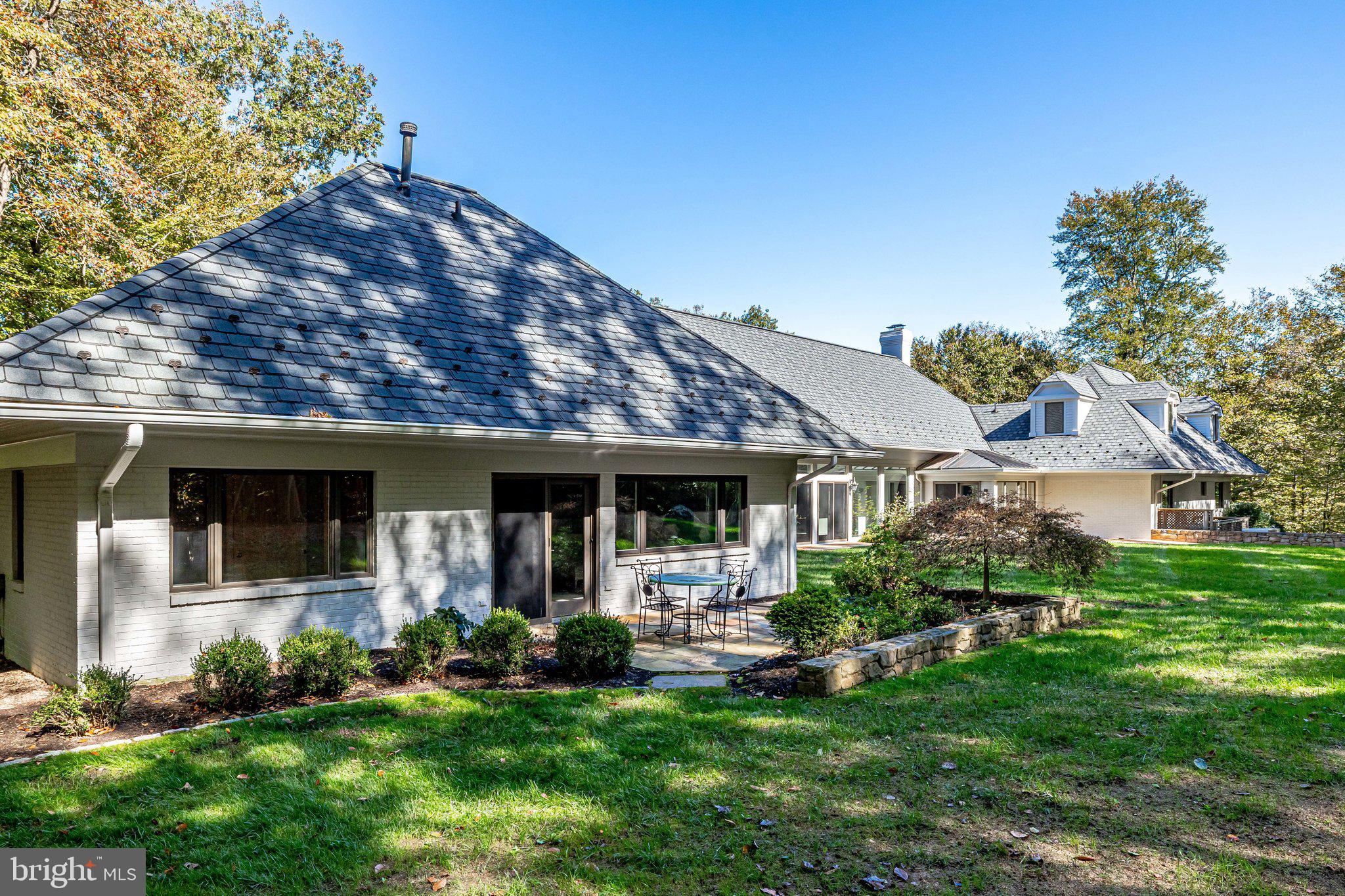 137 Yarnick Road Great Falls, VA 22066 - Photo 55 of 61 Enjoy coffee on Owner's Suite patio!