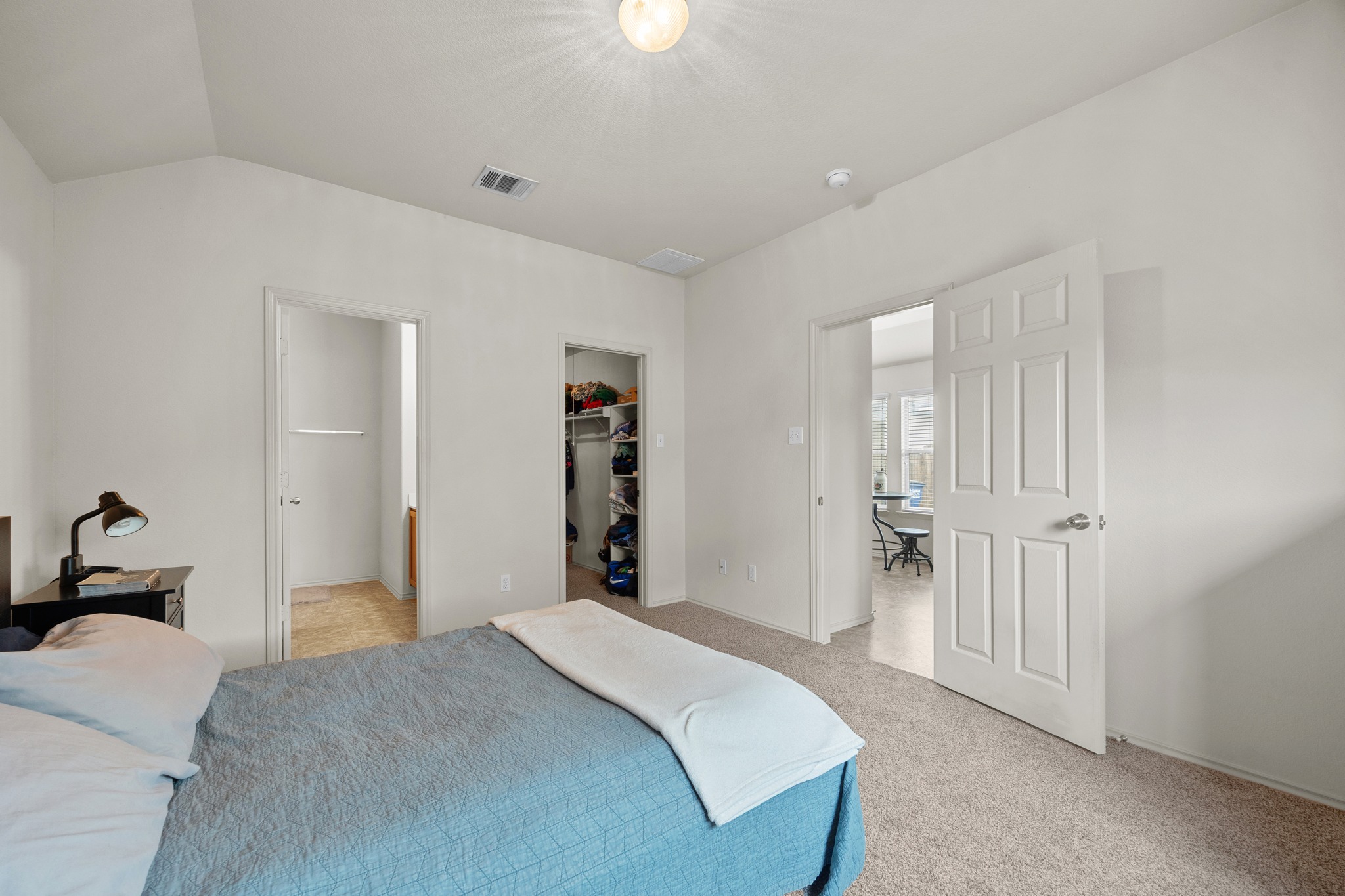 621 Amber Lane Jarrell, TX 76537 - Photo 14 of 22 a bedroom with a bed and closet